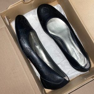 Naturalizer black flats with floral cutouts and scalloped edge